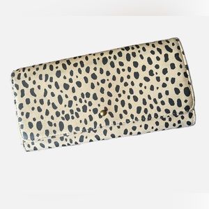 Tri-fold spotted wallet